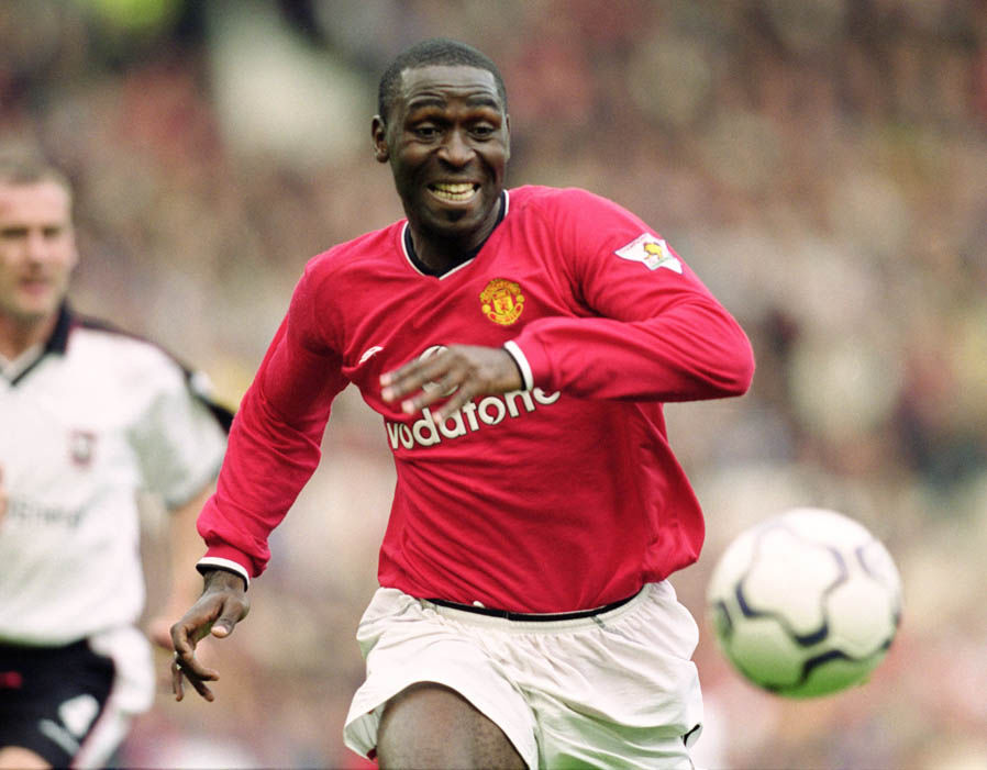 Chuyển đến thi đấu cho Man Utd từ 1995 - 2001, ông ghi được 93 bàn sau 195 trận ra sân.