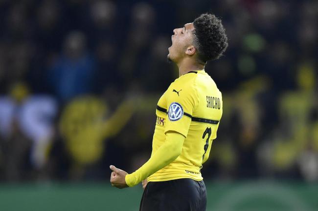 Dortmund's Sancho told to 'grow up' by teammate Can after haircut lockdown breach - Bóng Đá