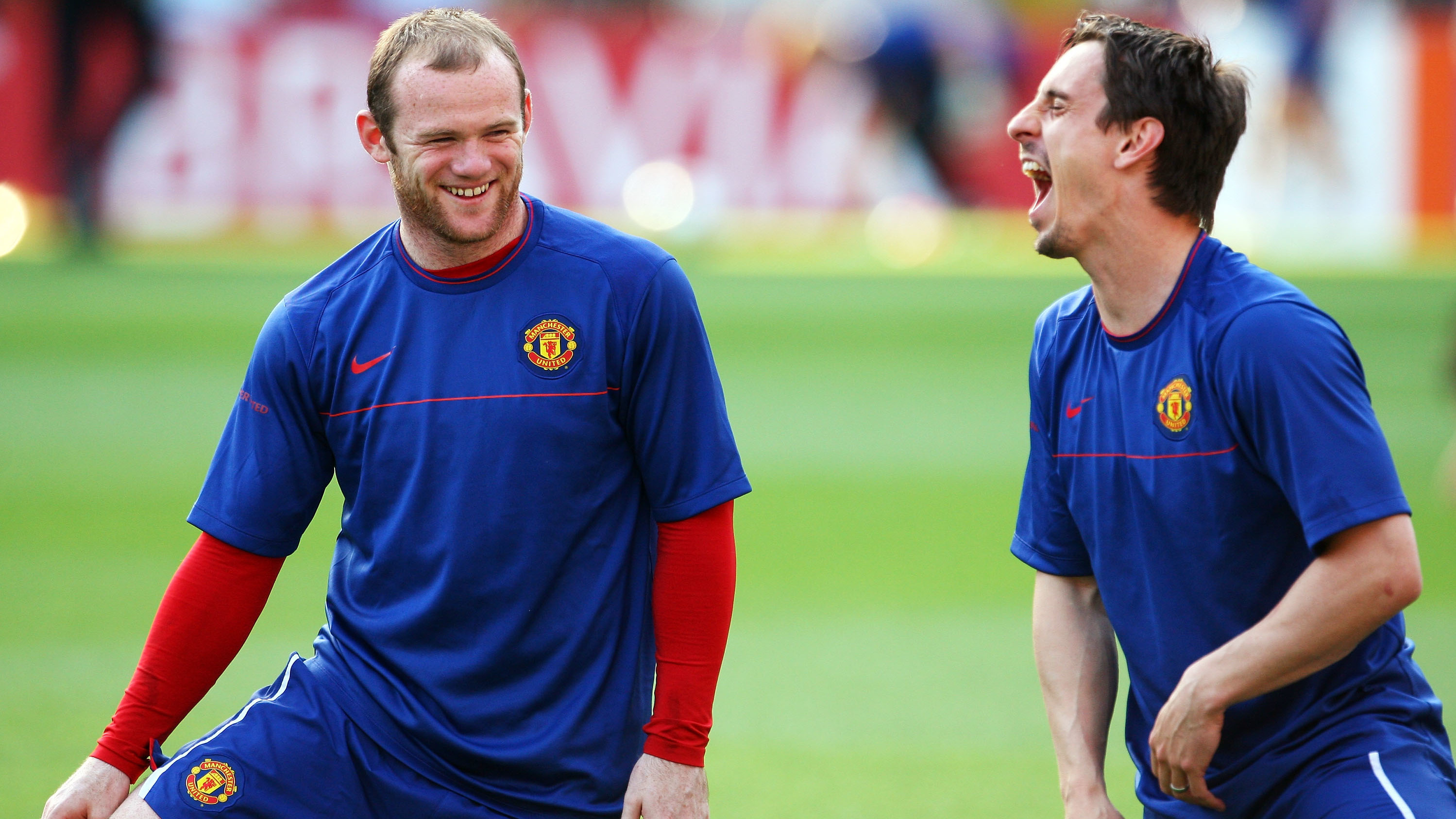Neville và Rooney khi còn thi đấu chung.
