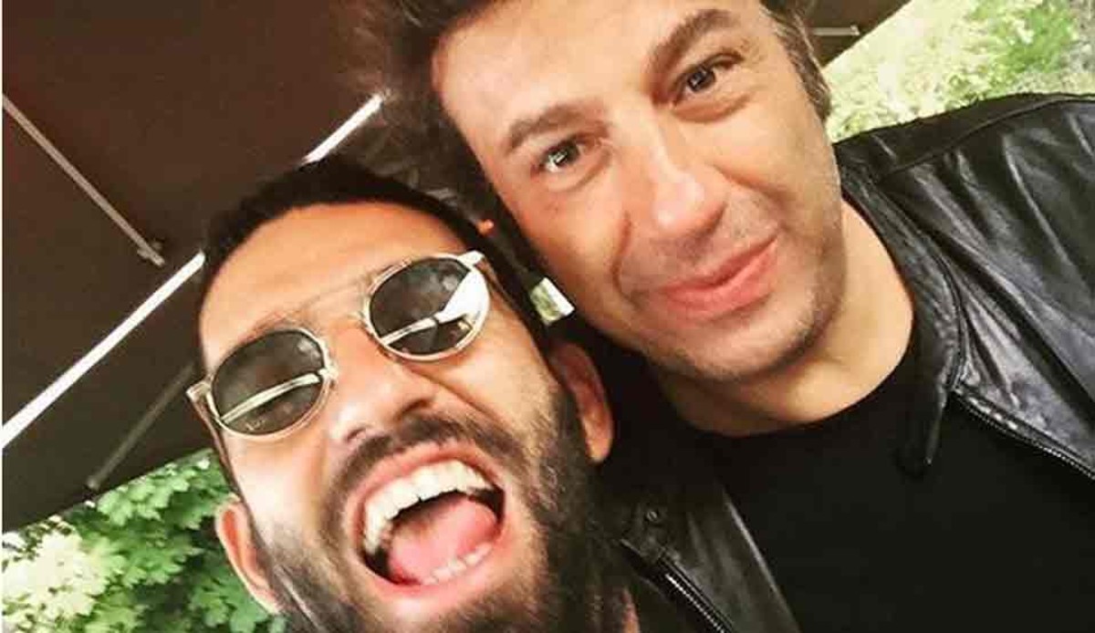 Turan và người đại diện Ahmet Bulut.