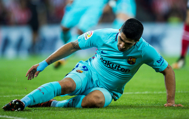 Luis Suarez chưa san sẻ gánh nặng ghi bàn với Messi.