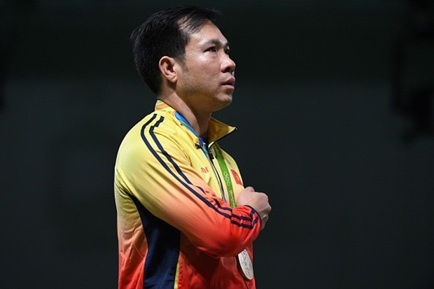 Xạ thủ Hoàng Xuân Vinh vượt qua khó khăn để vươn tới đỉnh vinh quang. Ảnh: Internet.