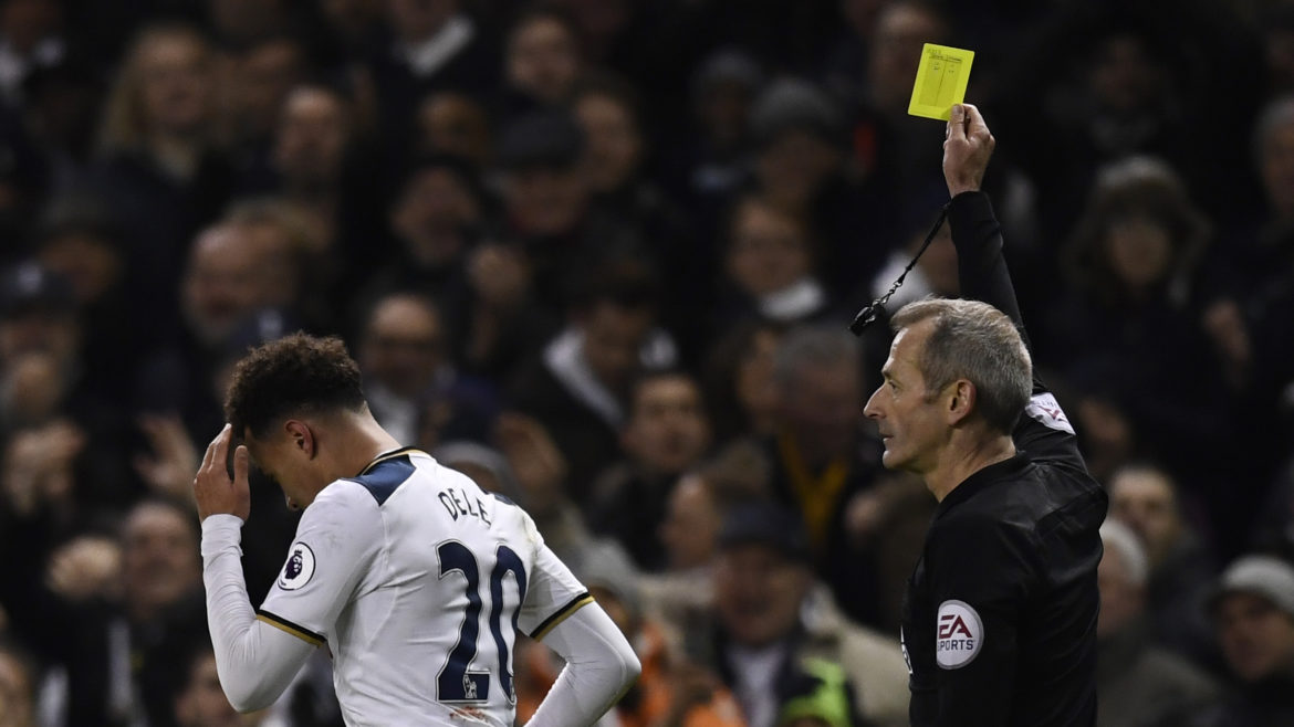 Alli nhận thẻ vàng sau khi ăn mừng bàn thắng. Ảnh: Eurosport.