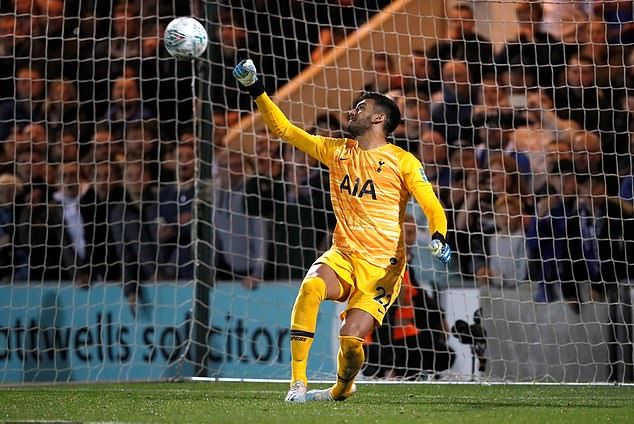 Colchester striker Jevani Brown guilty of 'worst ever' Panenka penalty as Tottenham keeper has time to get up off the floor  - Bóng Đá