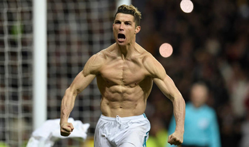 Thường xuyên cởi áo khoe thân ăn mừng song Ronaldo khẳng định anh "không tập gym để làm màu". Ảnh: Getty Images.
