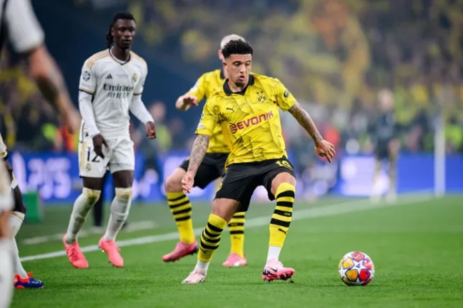 Sancho trở lại Man Utd.