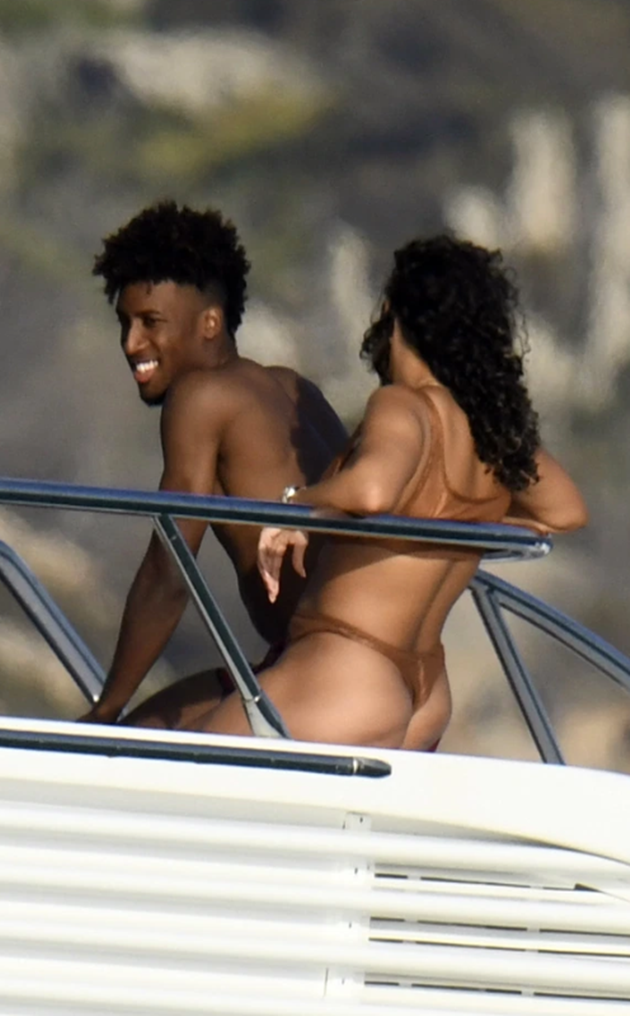 Kingsley Coman straddled by stunning fiancee on boat as Bayern Munich’s Champions League hero relaxes in Sardinia - Bóng Đá