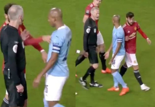 Fernandes hai lần dùng tay đẩy Fernandinho.