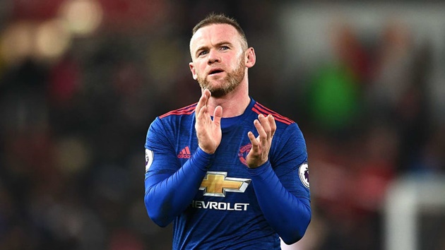 Rooney trong màu áo Man United.