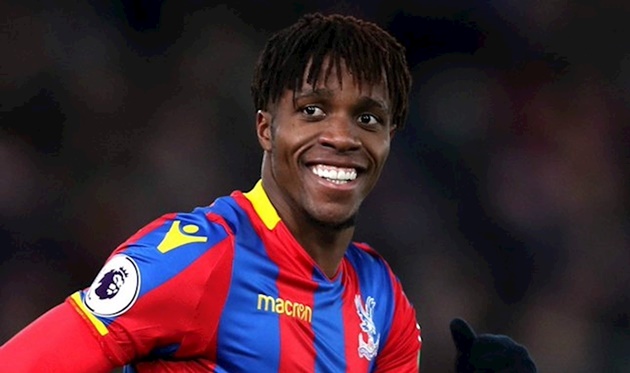 Paul Merson is urging the Gunners to sign Wilfried Zaha this summer  - Bóng Đá