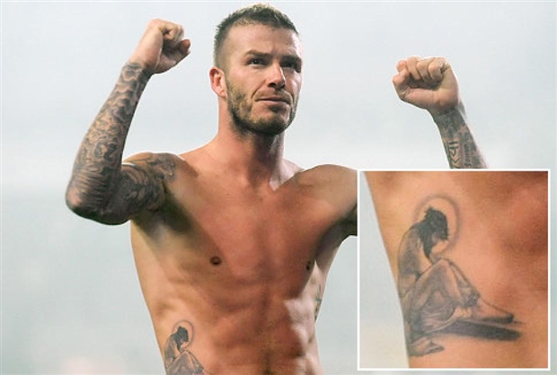 David Beckham khoe hình xăm và kiểu tóc mới khi đi nghỉ cùng hai con ở Italy