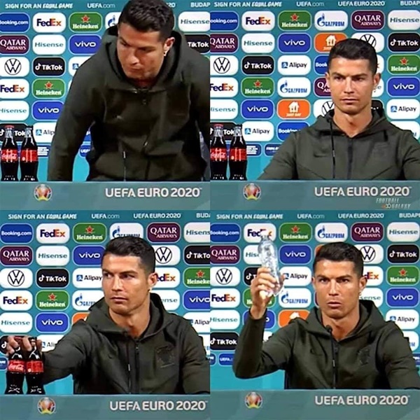 Ronaldo gạt bỏ 2 chai Coca của nhà tài trợ.