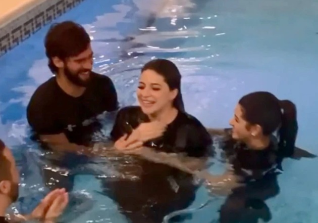 Alisson’s conducted more baptisms than he’s let in goals in 2020 after Liverpool ace helps Fred’s wife in pool ceremony - Bóng Đá
