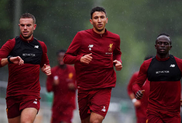 Ảnh bài viết Vừa tới Đức, Liverpool đã vội 'đội mưa' lao vào tập luyện