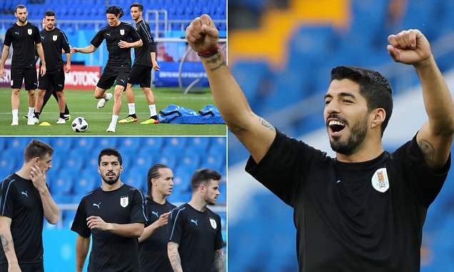 Cười tươi trên sân tập Uruguay, Suarez tạm quên đi khởi đầu tệ hại
