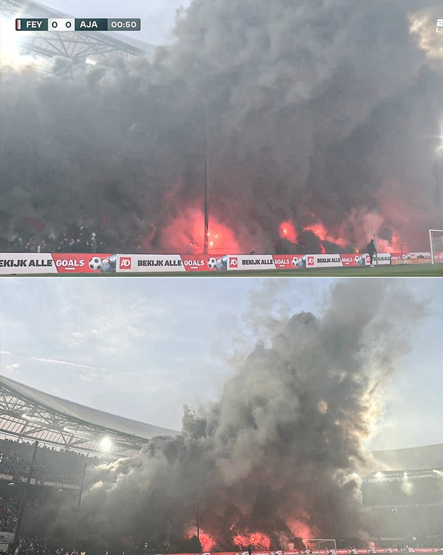 Feyenoord vs Ajax stopped TWICE as ex-Prem star bleeding after object thrown from crowd and stadium flooded with smoke - Bóng Đá