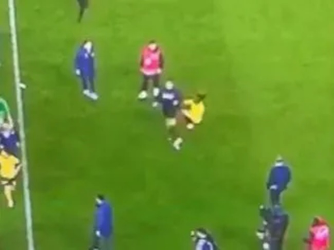 Michy Batshuayi attempted a “spinning high kick” on a fan after hundreds invaded the pitch - Bóng Đá