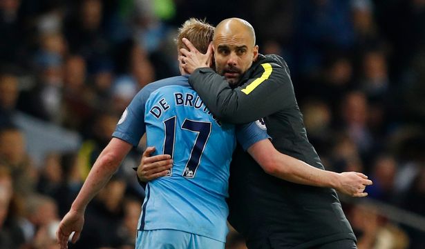 Manchester-City-manager-Pep-Guardiola-hugs-Kevin-De-Bruyne-as-he-substituted-off