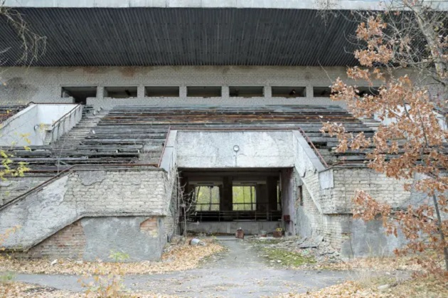 RADIOACTIVE RUINS Inside abandoned football stadium in heart of Chernobyl with forest growing on pitch years after devastating disaster - Bóng Đá