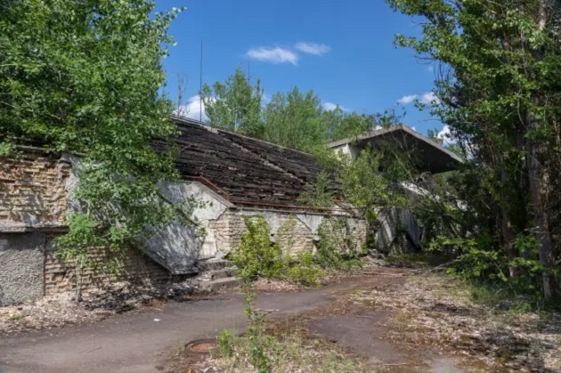 RADIOACTIVE RUINS Inside abandoned football stadium in heart of Chernobyl with forest growing on pitch years after devastating disaster - Bóng Đá