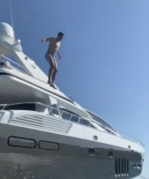Courtois' risky jump off a yacht - Bóng Đá