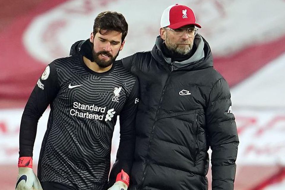 Klopp như người cha thứ hai của Alisson.