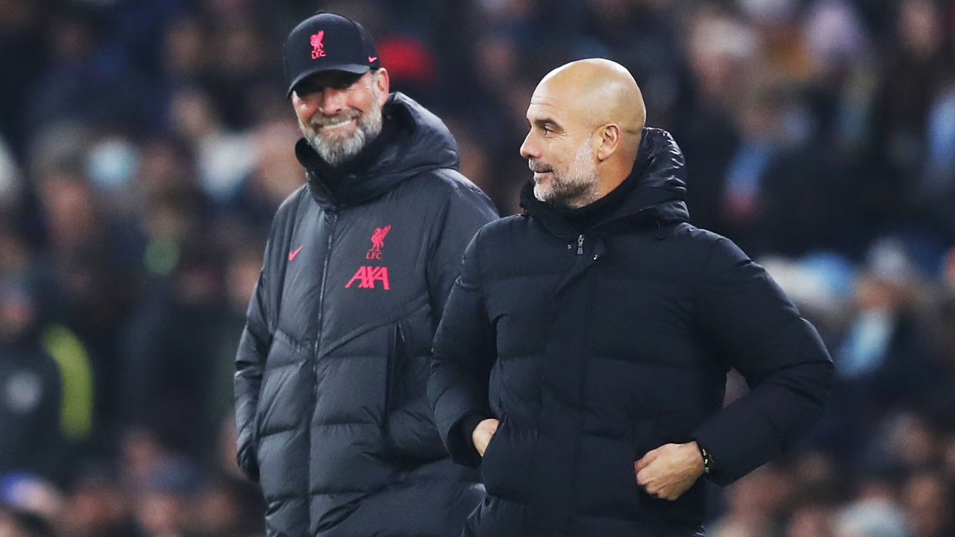 Pep Guardiola (trái) và Jurgen Klopp (phải) đại diện cho hai trường phái đối lập về nhịp độ chơi bóng.