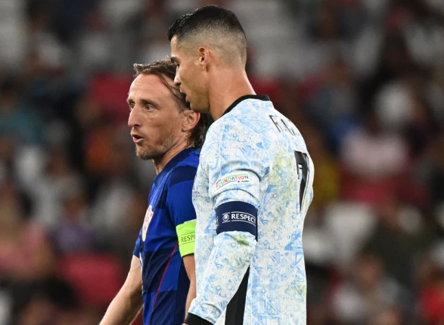 Ronaldo và Modric sẽ đối đầu nhau ở vòng 32 đội. Ảnh: Getty Images.