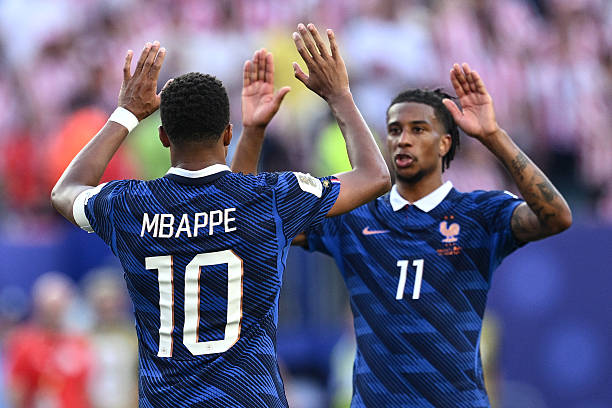 Michael Olise và Kylian Mbappe đang hợp tác tốt với nhau. Ảnh: Getty Images