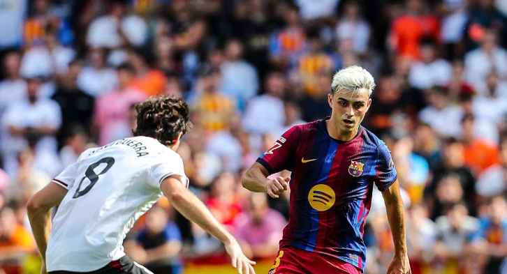 Pedri – 7.9 điểm: "Nhạc trưởng" của Barcelona có một ngày thi đấu thăng hoa. Pedri điều tiết trận đấu và trực tiếp ghi tên mình lên bảng tỷ số ở phút 79 với một pha dứt điểm quyết đoán. Ảnh: Ivan Terron/Getty.