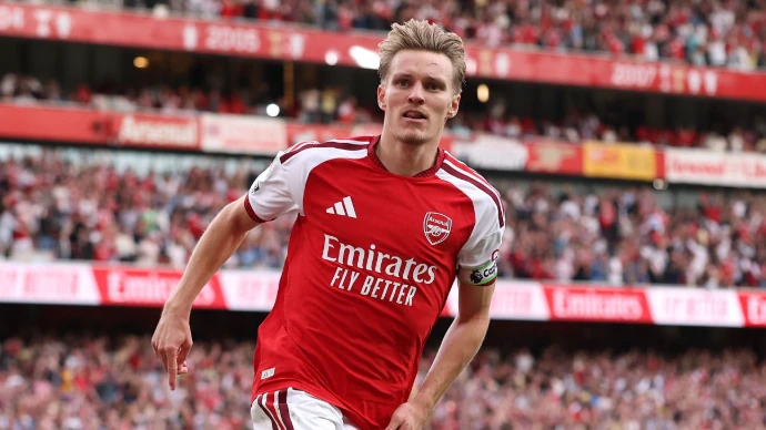 Odegaard tỏa sáng ở chiến thắng trước Chelsea. Ảnh: Justin Setterfield/Getty Images.