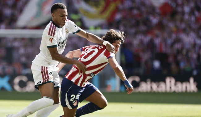 Kylian Mbappe - 6.3 điểm: Tỏ ra đơn độc trên hàng công Real. Mbappe có vài tình huống bứt tốc nỗ lực nhưng không thể tạo nên đột biến trước hàng thủ kỷ luật của Atletico. Ảnh: EPA.