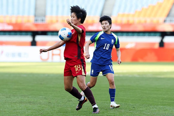 Nữ H&agrave;n Quốc đ&aacute;nh bại nữ Trung Quốc để gi&agrave;nh huy chương đồng. Ảnh:  Zhizhao Wu/Getty Images.