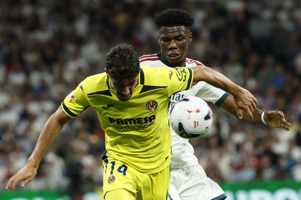 Aurelien Tchouameni: 7,3 điểm. Phân phối bóng khá tốt và có nhiều pha tranh chấp mạnh mẽ, giúp Real Madrid duy trì sự chắc chắn ở tuyến giữa. Ảnh: EPA.